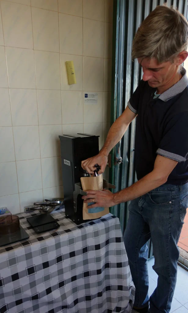 Wesley grinding coffee