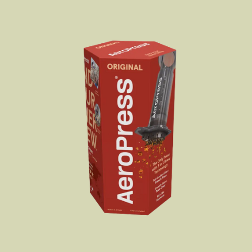 AeroPress Original coffee maker packaging on a beige background