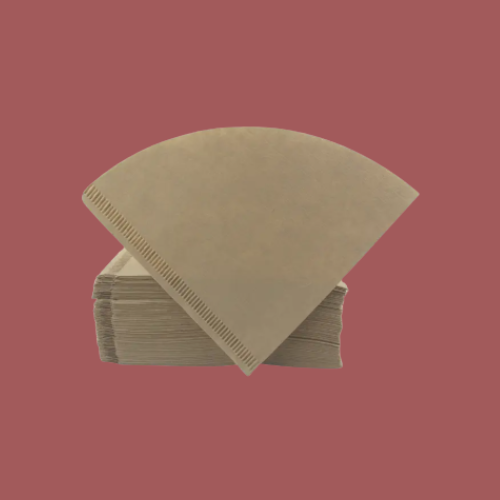 100-pack of Monkano paper filters for porcelain coffee filters on a red background